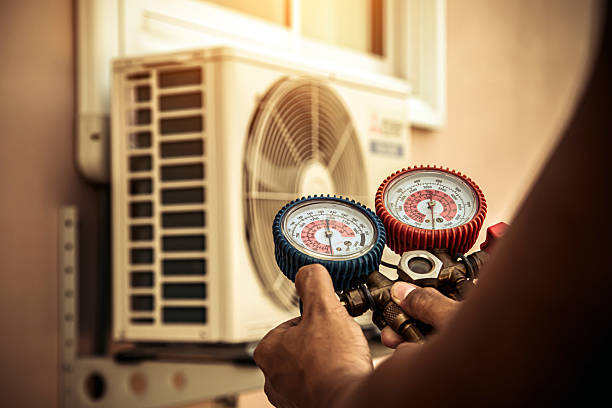 Professional Ductwork Repair technician working in Montchanin, DE